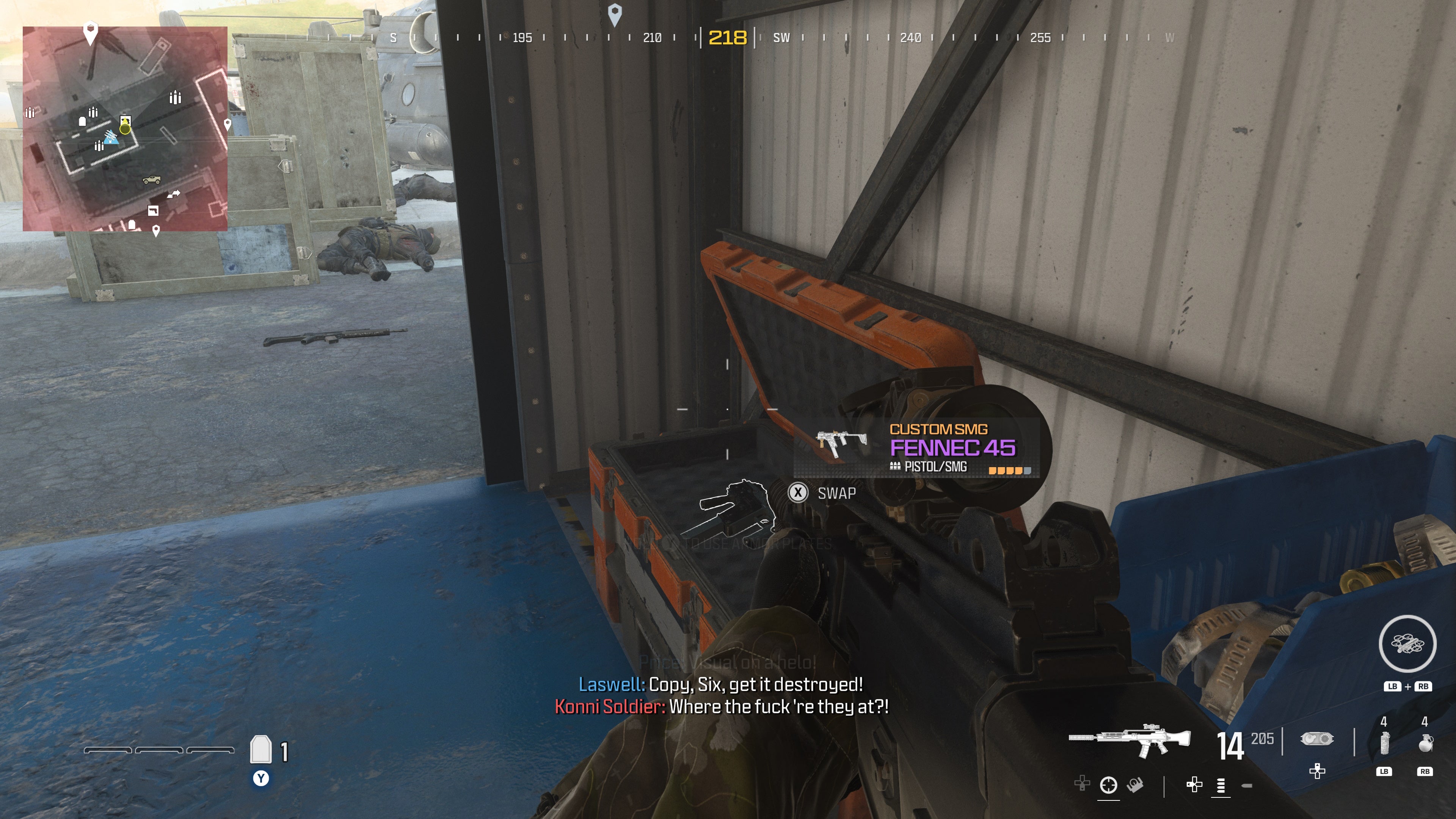 looking at an item in an open orange supply box on the reactor level