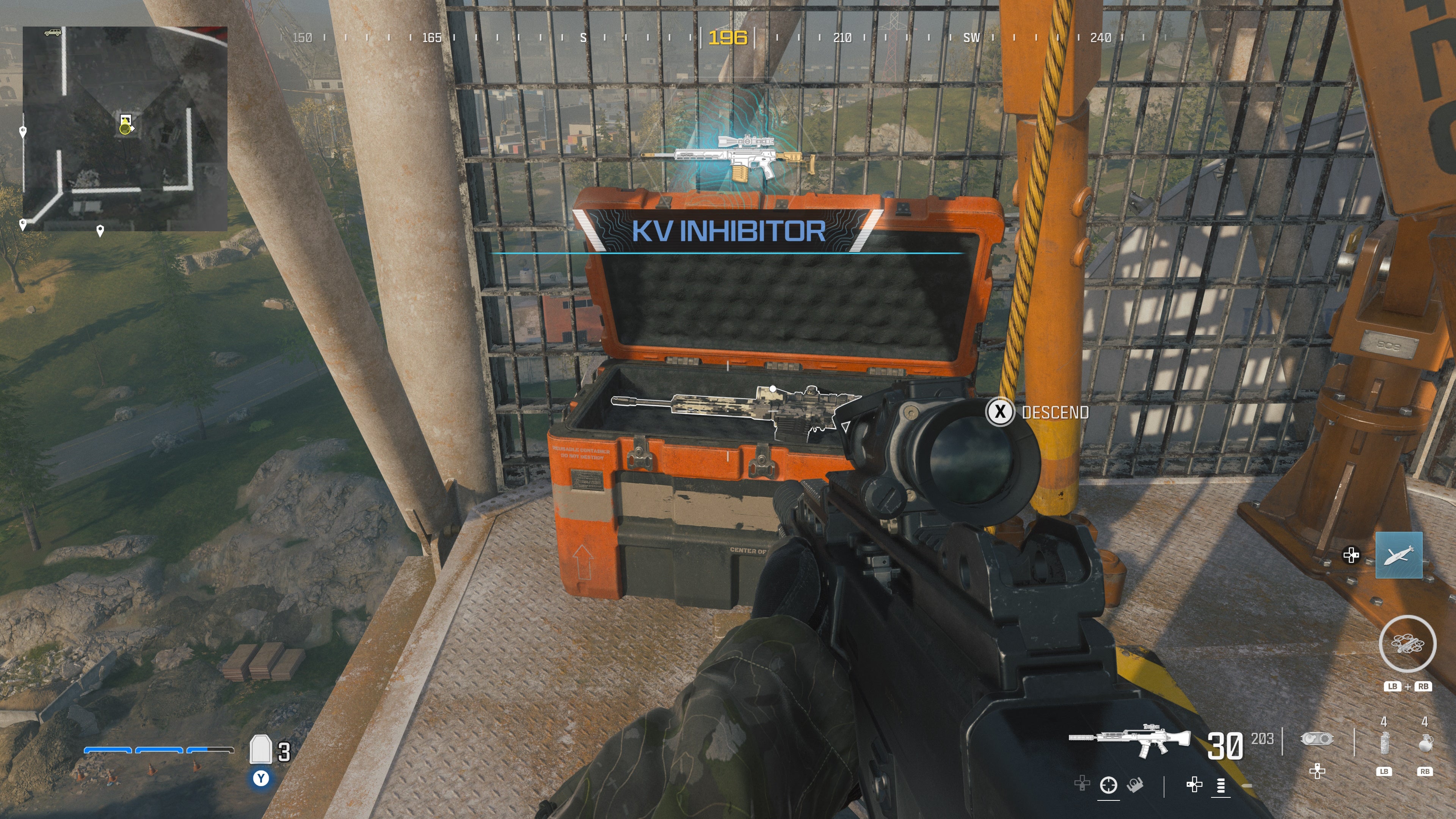 looking at an item in an open orange supply box on the reactor level