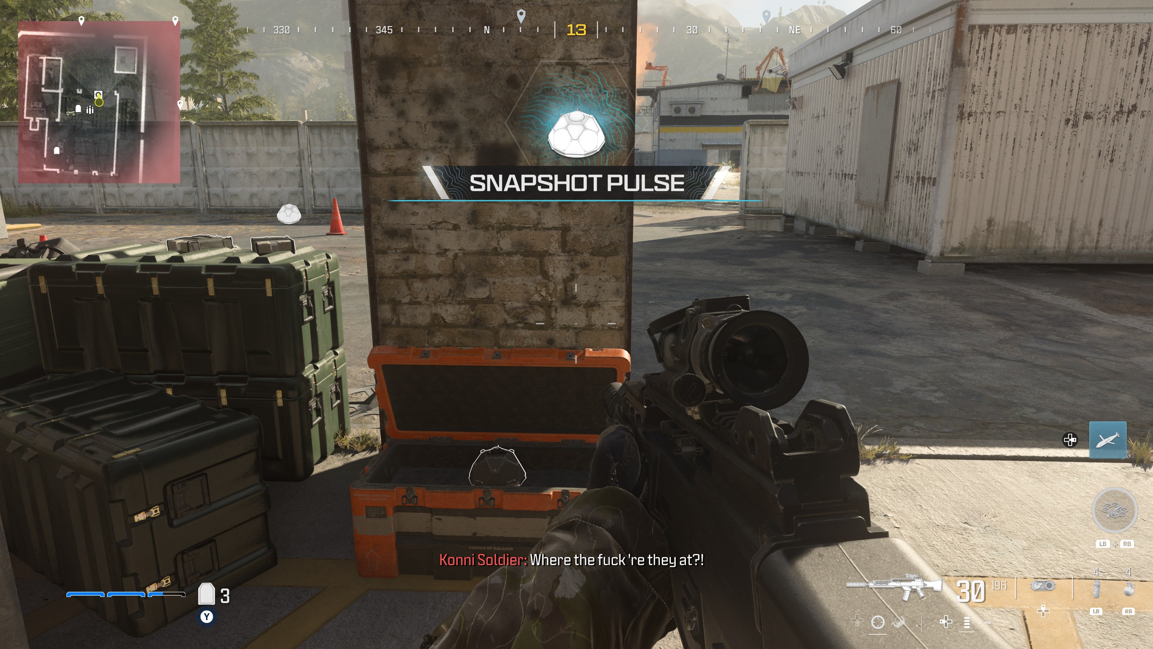 looking at an item in an open orange supply box on the reactor level