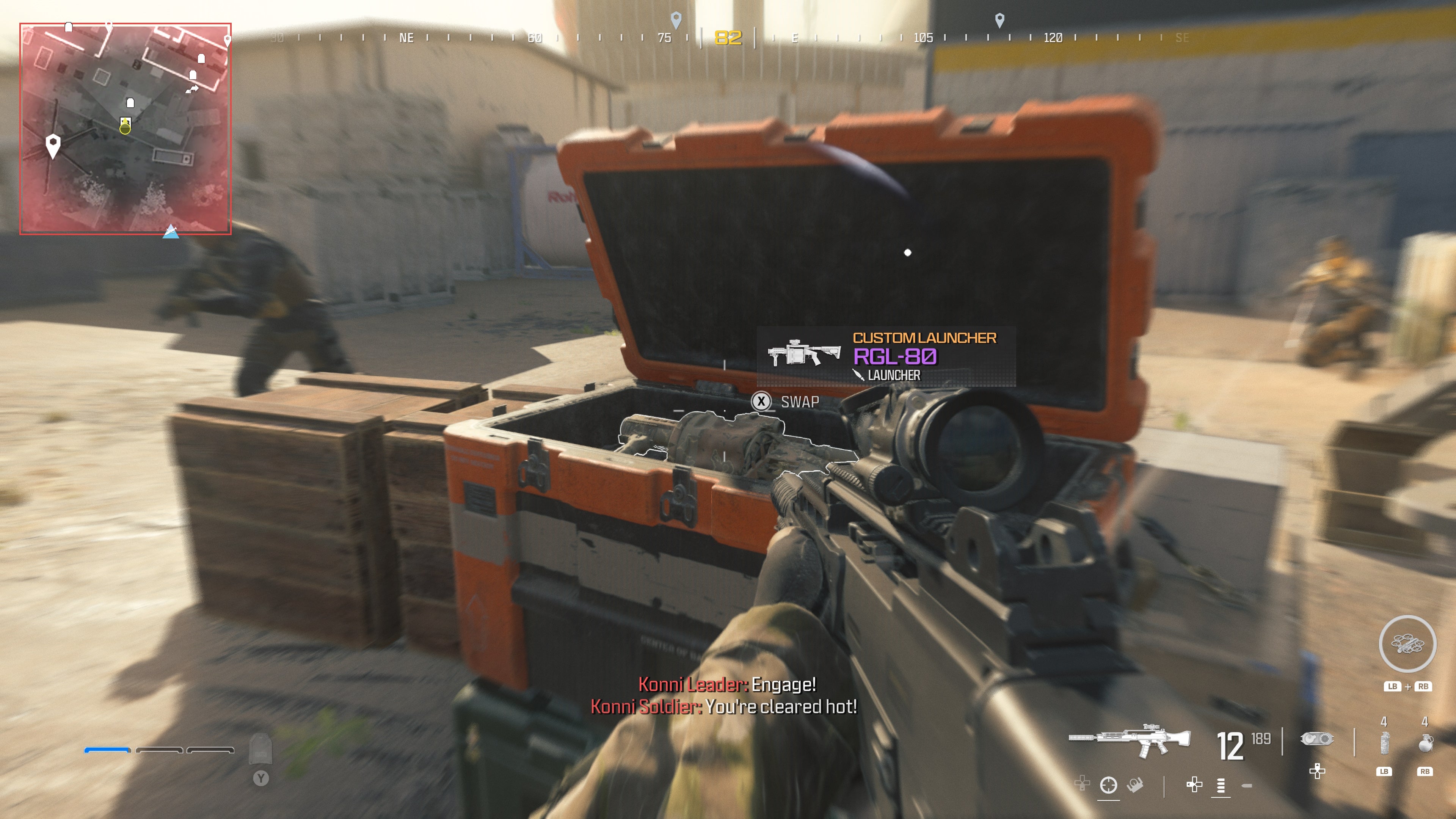 looking at an item in an open orange supply box on the reactor level