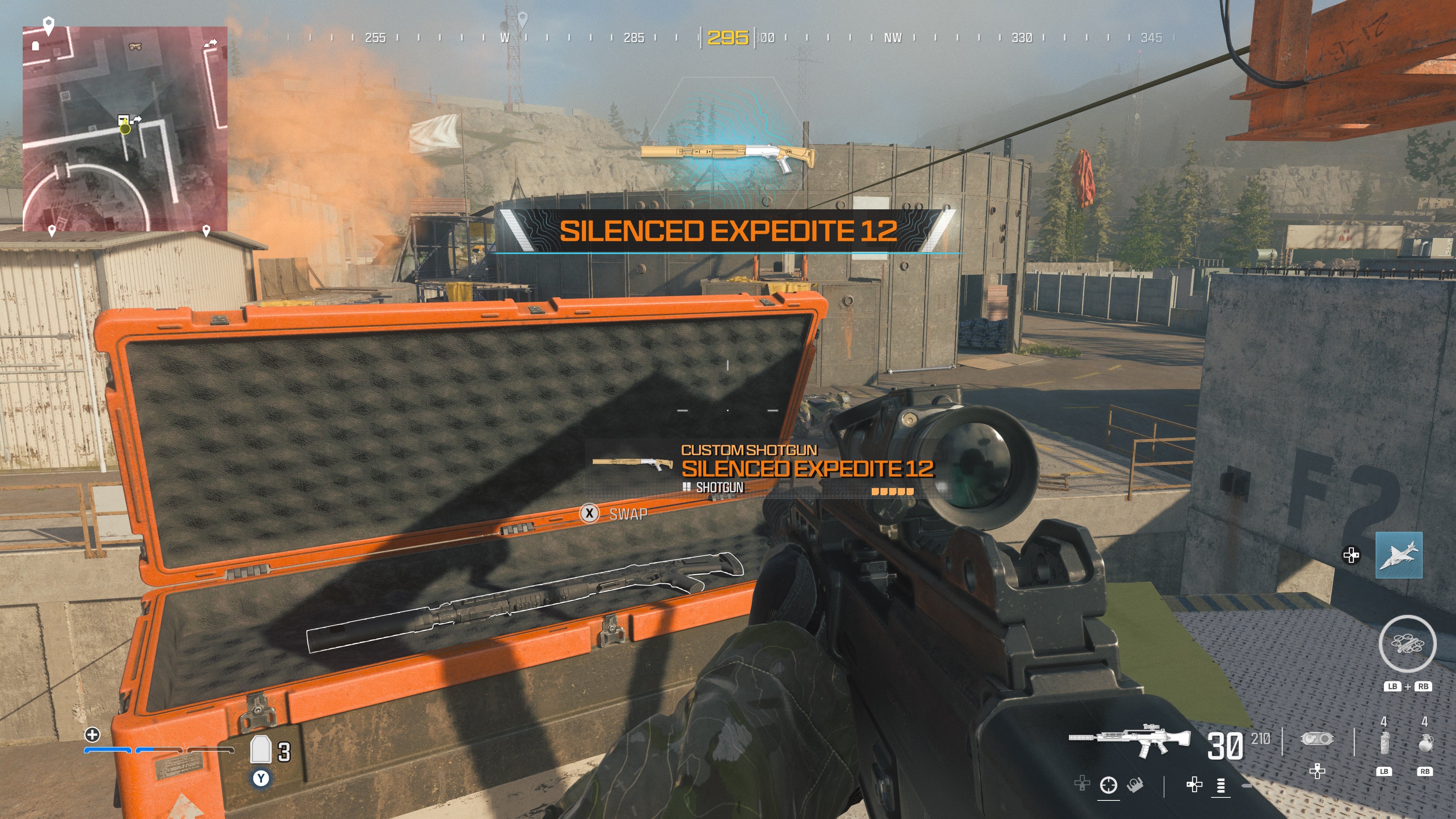 looking at an item in an open orange supply box on the reactor level