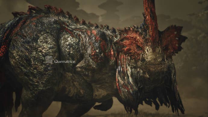 Monster Hunter Wilds screenshot showing a large Quematrice monster up close.