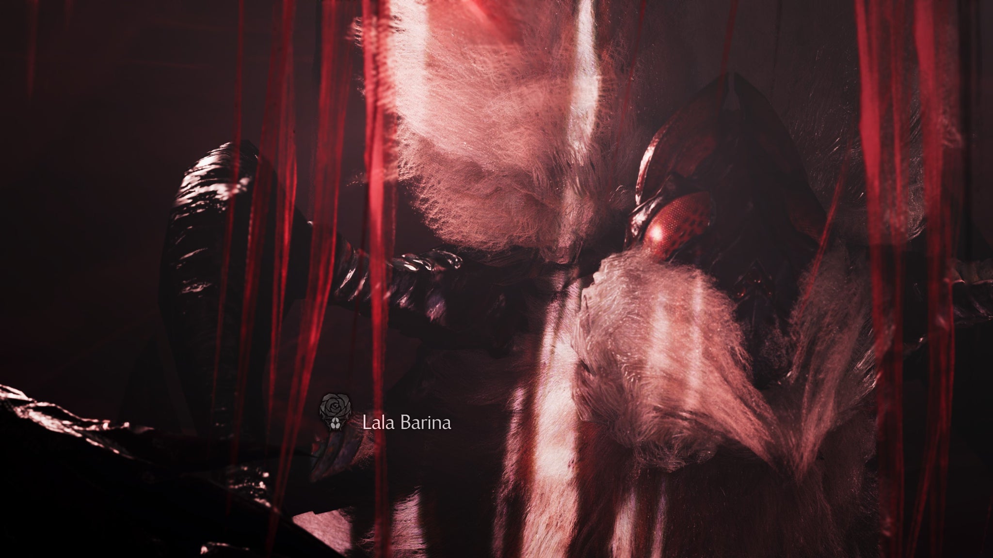 Monster Hunter Wilds screenshot showing an up-close view of the Lala Barina spider monster's body. - 5