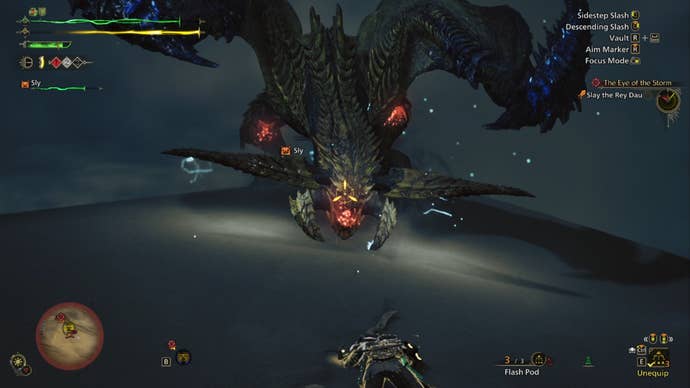 A Monster Hunter Wilds screenshot showing a glowing red weak point in the Rey Dau monster’s mouth.
