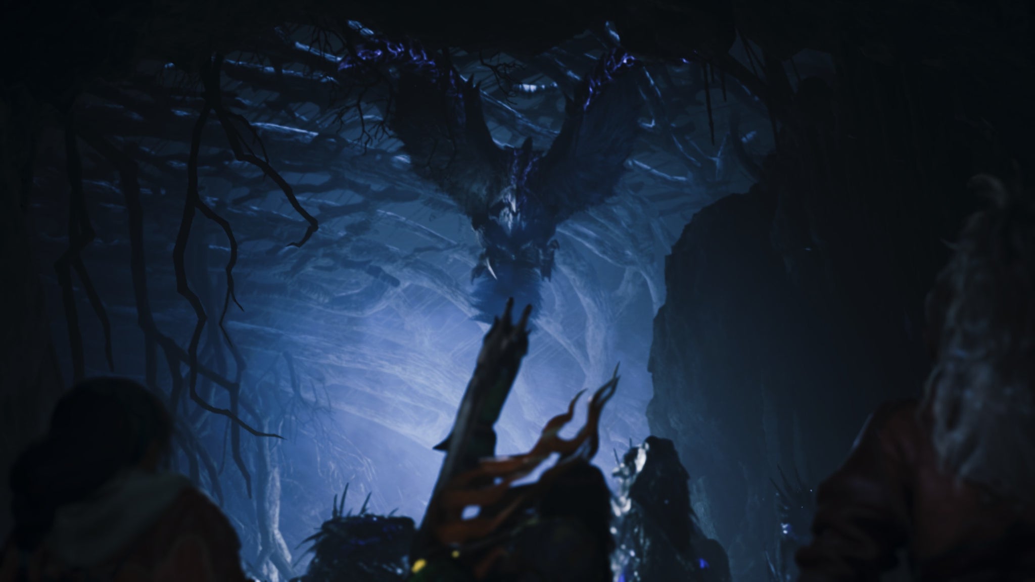 A Monster Hunter Wilds screenshot showing the Guardian Arkveld soaring through the underground air toward the hunter and their group. - 9