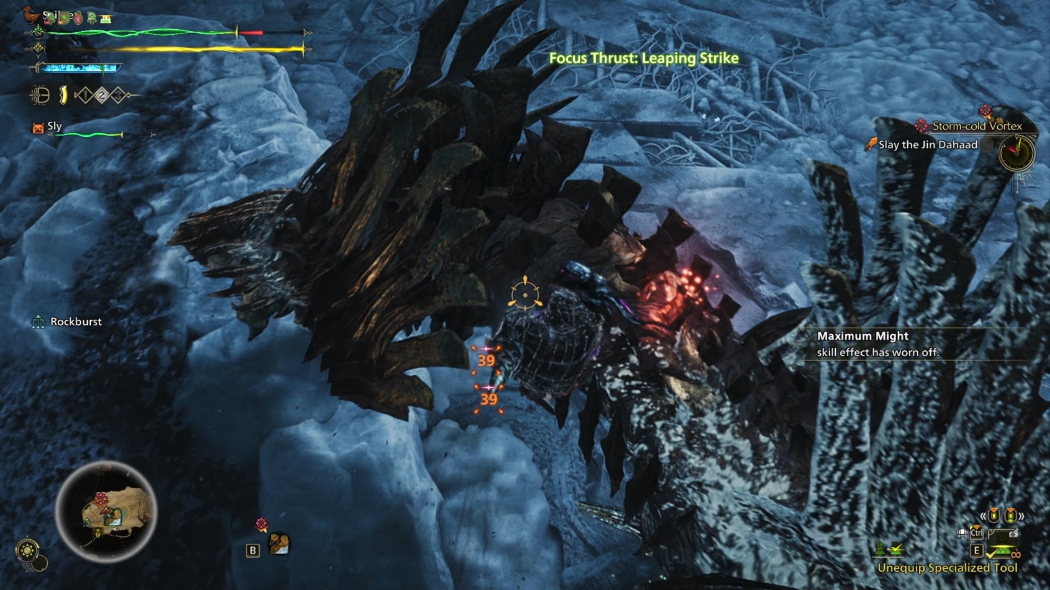 A Monster Hunter Wilds screenshot showing the hunter attacking Jin Dahaad's head where there are large brown plate ridges. - 5