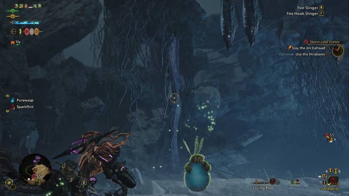 A Monster Hunter Wilds screenshot shows a purple hanging Hirabami hiding in the background.
