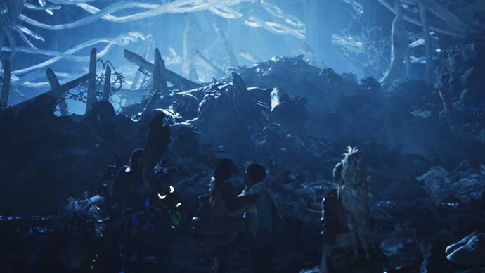 A Monster Hunter Wilds screenshot showing the hunter and their three companions watching Arkveld back as they eat.