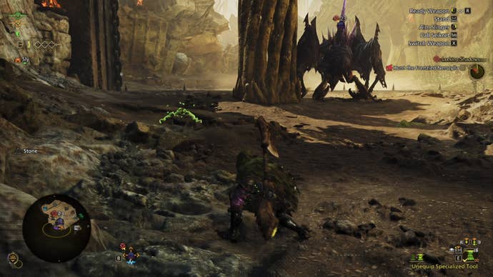 A Monster Hunter Wilds screenshot of the hunter wearing a green Ghillie Mantle sneaking up on a Frenzied Nerscylla.