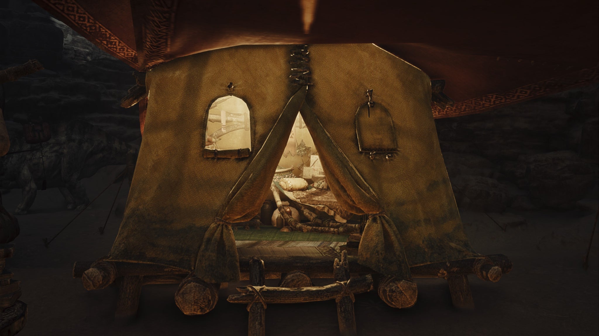 A Monster Hunter Wilds screenshot of a yellow tent with a brown tent fly. - 4