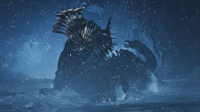 A Monster Hunter Wilds screenshot of the Jin Dahaad monster facing the camera as it snows heavily.
