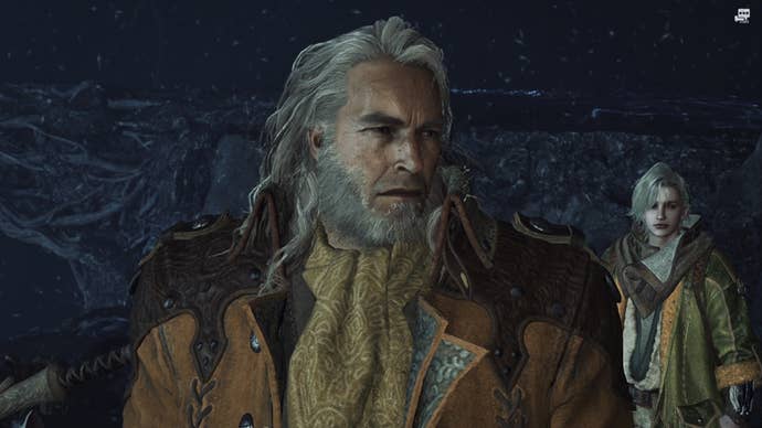 A Monster Hunter Wilds snowing screenshot close-up of Fabius with Erik in the background.