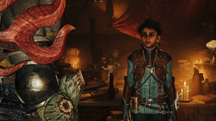 A Monster Hunter Wilds screenshot of Nata inside a tent with lit candles behind them.