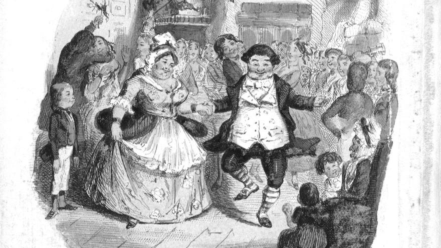 People dancing by the tree at Mr Fezziwig’s Ball in Charles Dickens’s story A Chrismas Carol