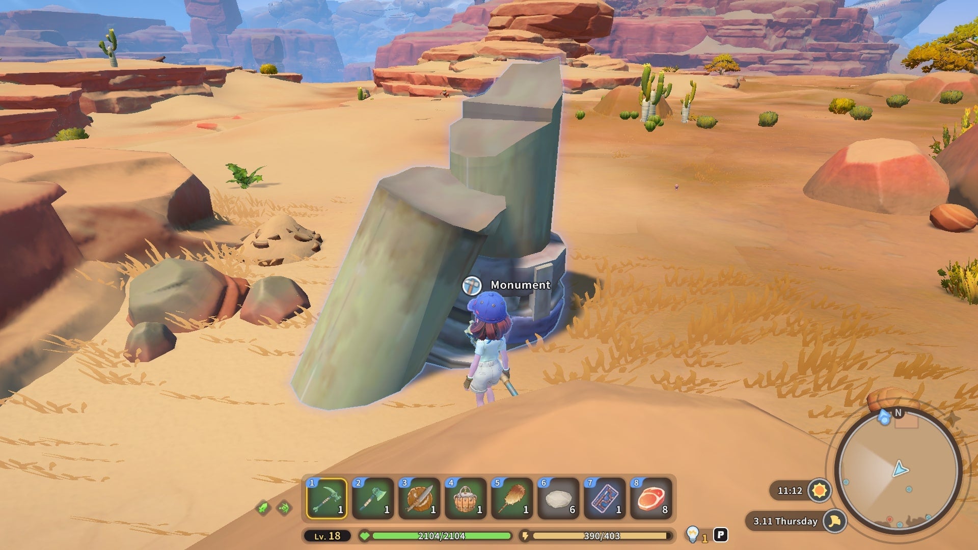 The player faces a monument in the desert behind their home in My Time at Sandrock - 3