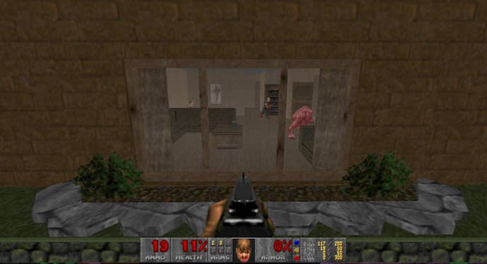 Looking through a window in MyHouse.wad, a DOOM mod, and seeing demons wandering around inside