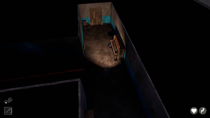 A building interior at night, lit by a player’s torch in top-down view