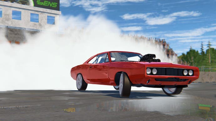A cheap red car with smoke on a grey track