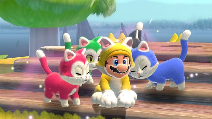 Best Mario Games - Super Mario 3D World screenshot showing Mario in a yellow cat suit being sniffed by other cats
