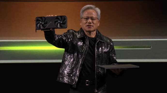 Nvidia boss Jensen Huang holds up a graphics card at the CES 2025 keynote