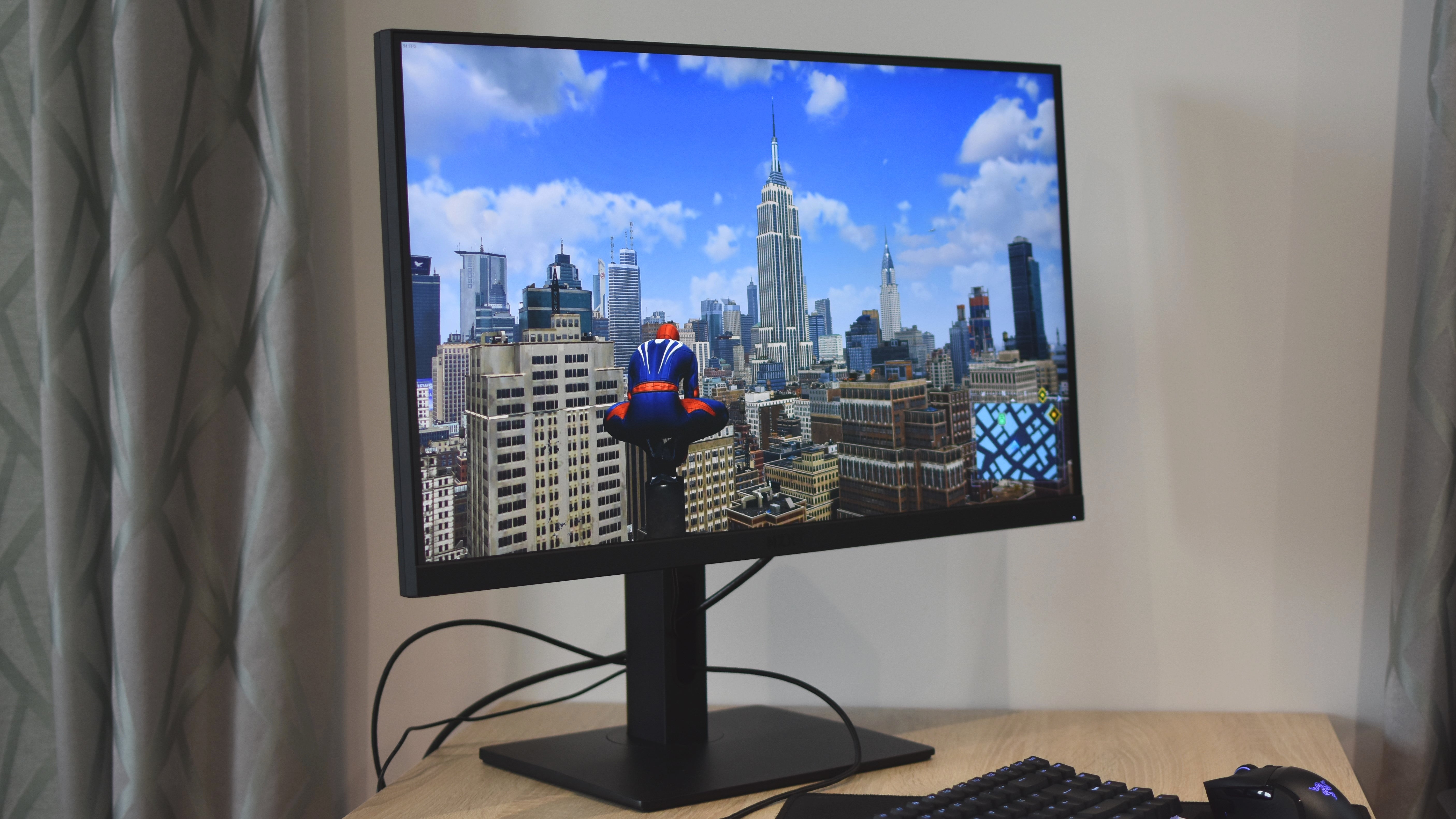 The NZXT Canvas 27Q gaming monitor, showing Marvel&rsquo;s Spider-Man Remastered.