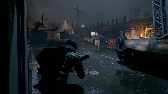 An early screenshot from Nakwon: Last Paradise showing the player from a third-person perspective at night, as they crouch in the ransacked Seoul streets and a zombie charges toward them.