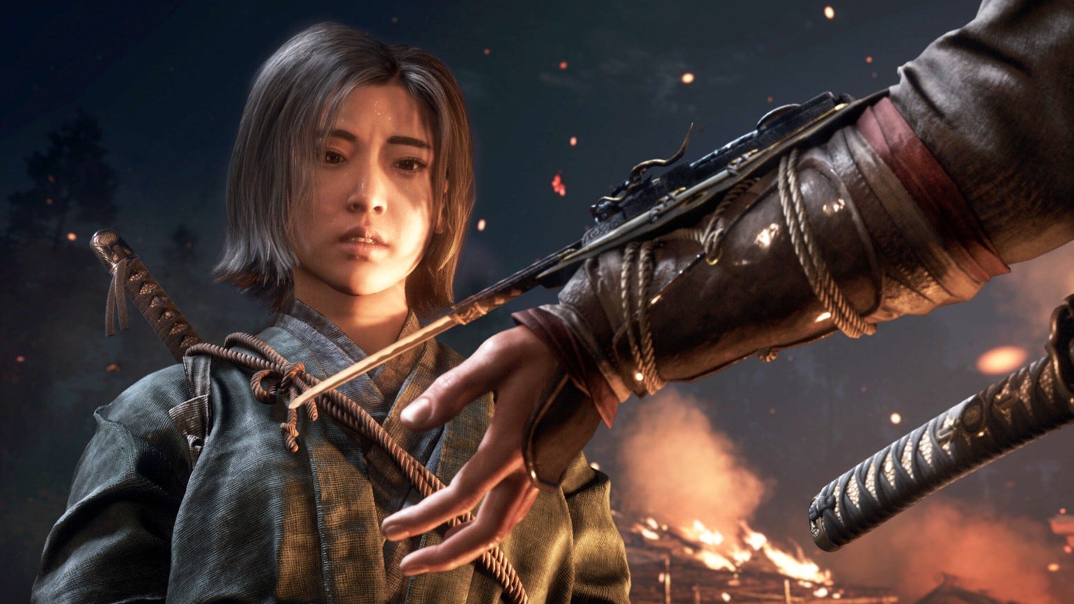 Naoe looks at a hidden blade in Assassin's Creed Shadows