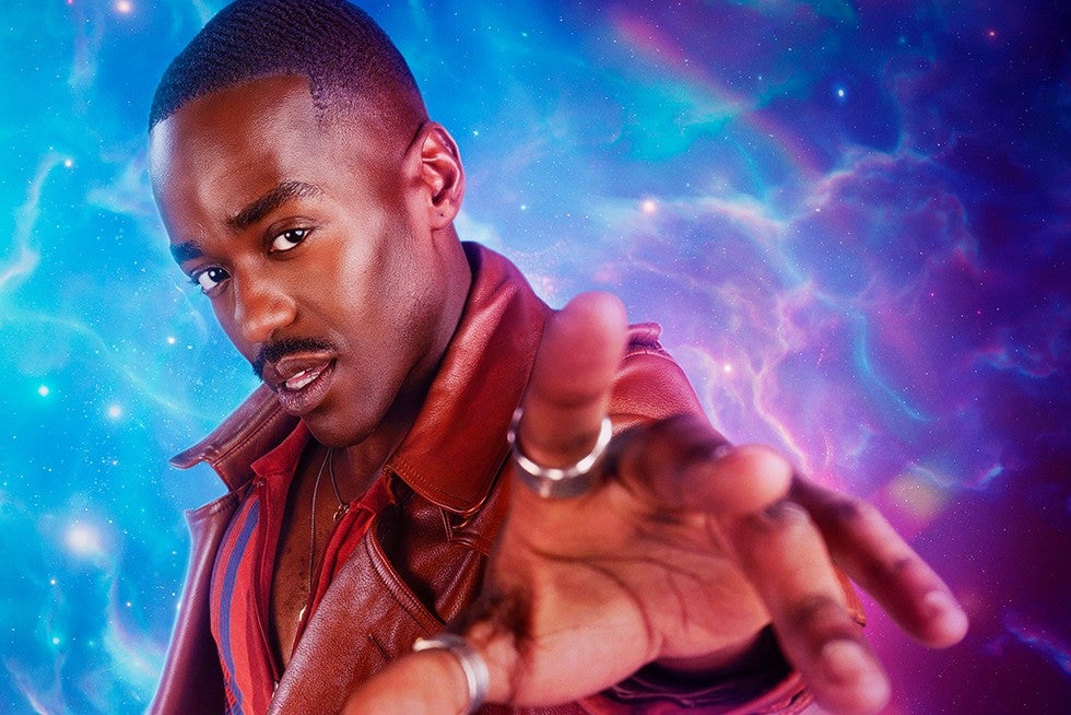 Ncuti Gatwa as the fifteenth Doctor Who, pointing towards the camera, wearing a ring.