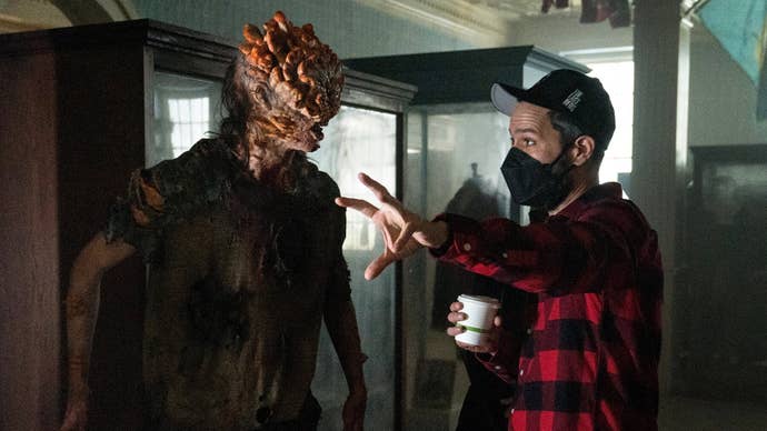 Naughty Dog’s Neil Druckmann on set of The Last of Us. He is chatting with a Clicker