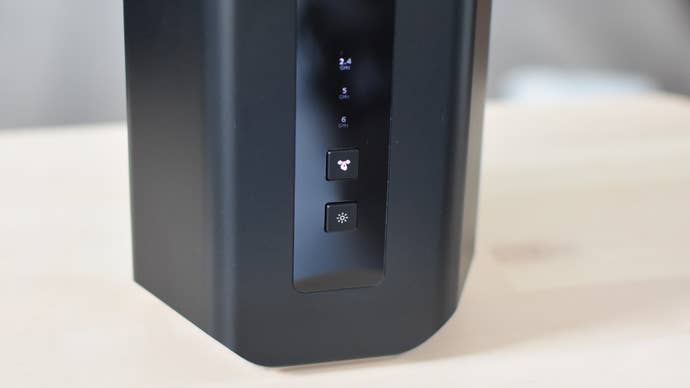 A closeup of the front interface and buttons on the the Netgear Nighthawk RS700 Wi-Fi 7 router.