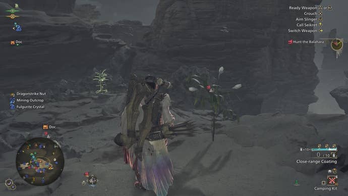 Standing by an Ephemeral Blossom in Monster Hunter Wilds.