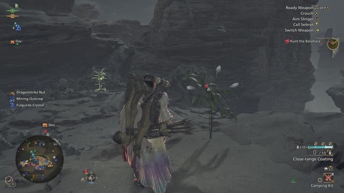 Standing by an Ephemeral Blossom in Monster Hunter Wilds.