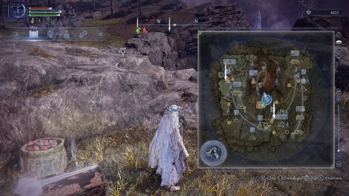 The Revenant stands beside a merchant while looking at the location of merchants on the map in Elden Ring: Nightreign