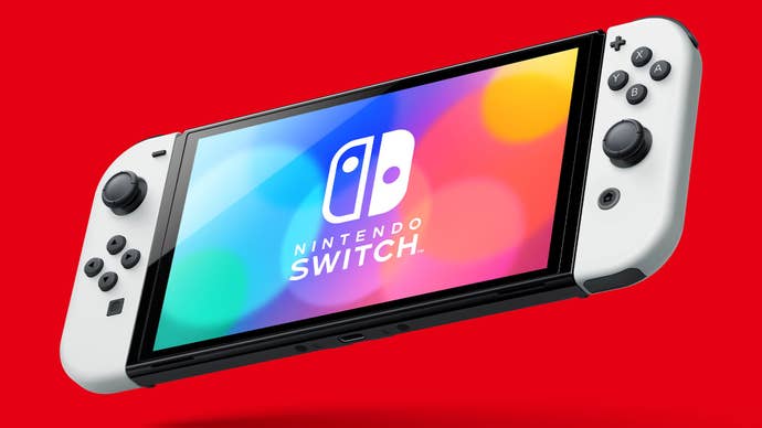 A Nintendo Switch Oled on a red background