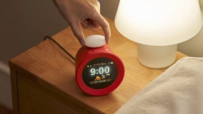 Nintendo interactive alarm clock alarmo on a bedside table