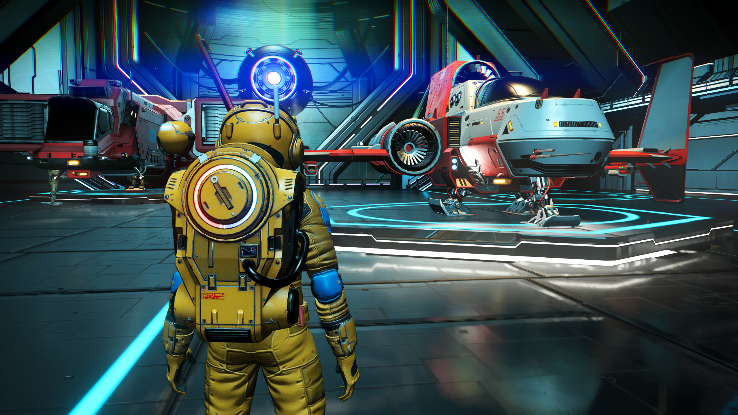DLSS used in No Man&rsquo;s Sky. A spaceman stands in front of some spaceships within a hangar.