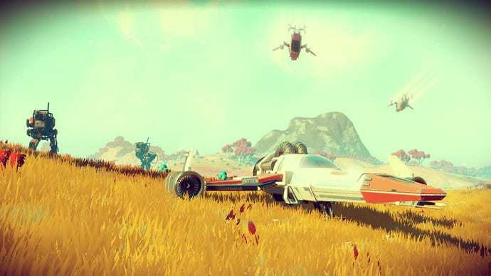 In No Man's Sky, a spaceship sits on a field while robotic walkers stomp around in the background.