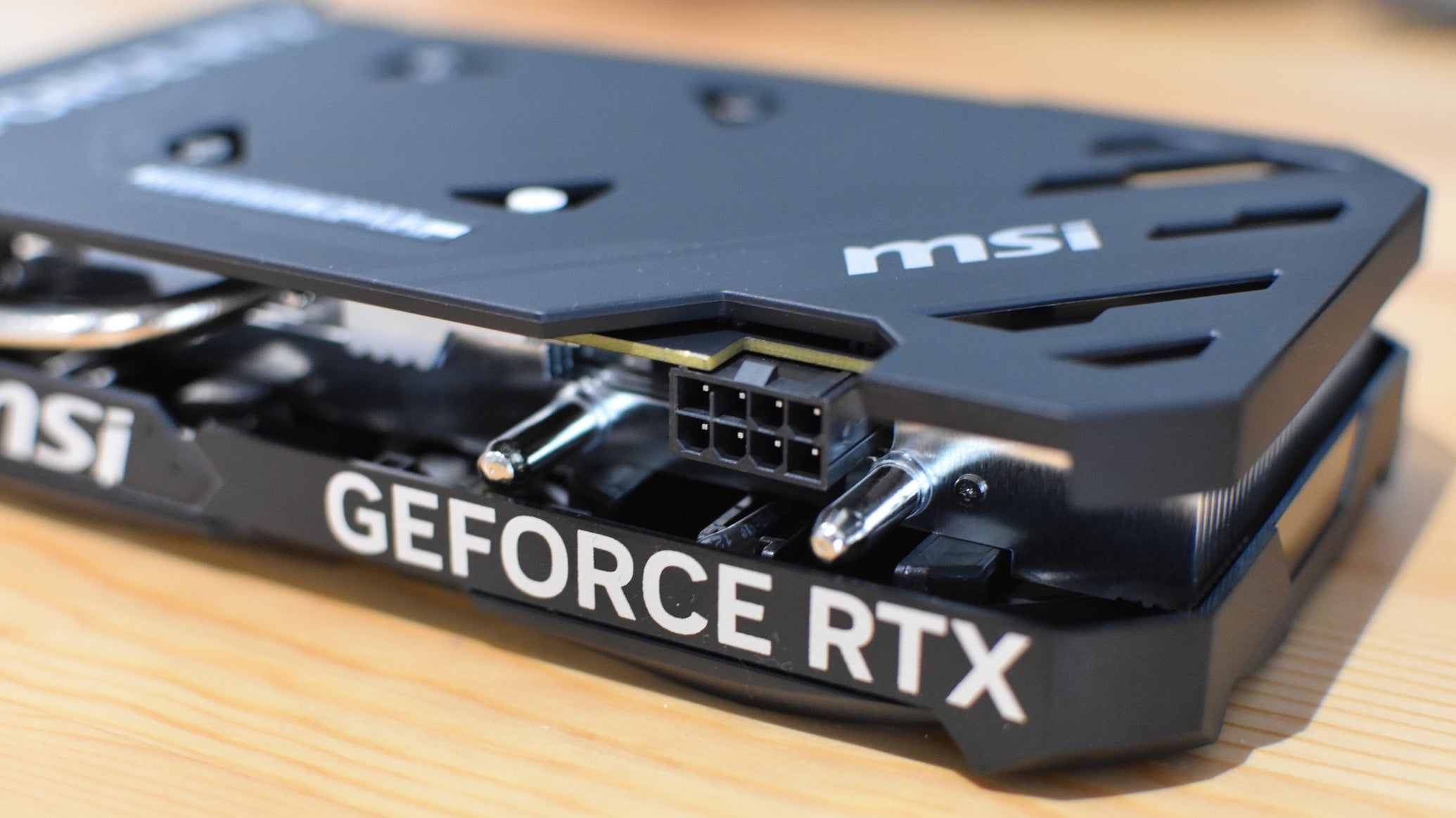 A closeup of the 8-pin power connector on an MSI GeForce RTX 4060 Ventus 2X.