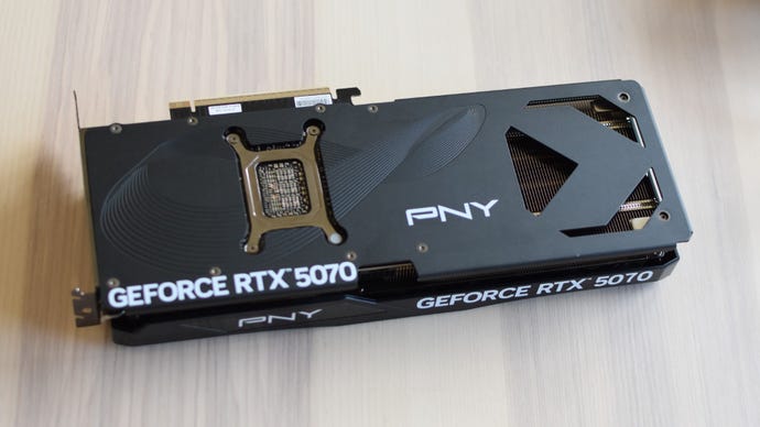 The PNY GeForce RTX 5070 OC connected a table, backplate-side-up.