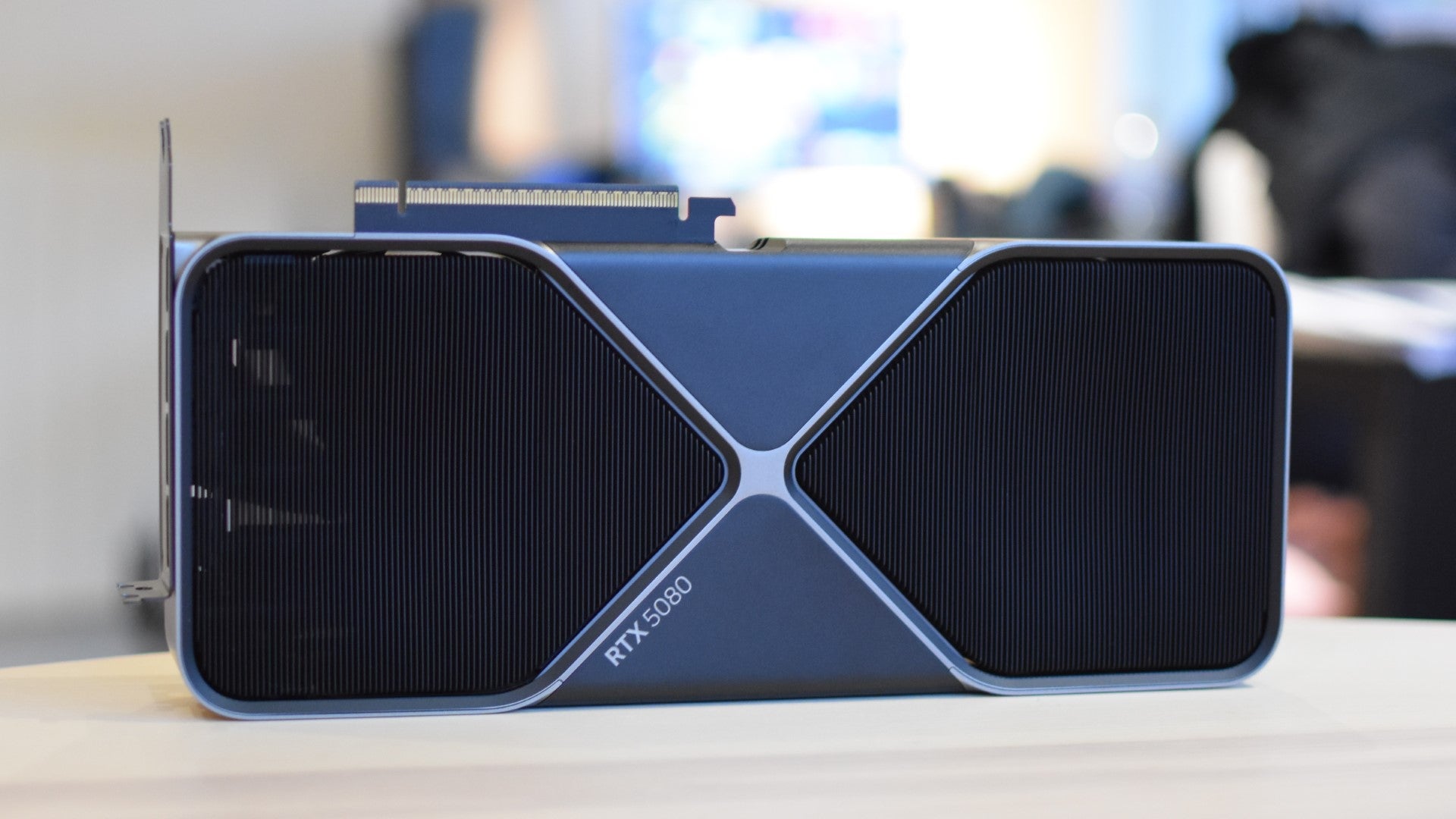 The Nvidia GeForce RTX 5080 Founders Edition on a table. - 10