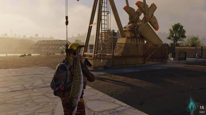 The player looks at an oilrig in Red Sands of Once Human