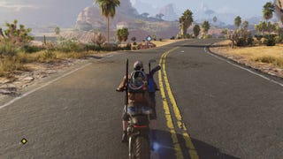 The player drives their motorcycle through Red Sands in Once Human