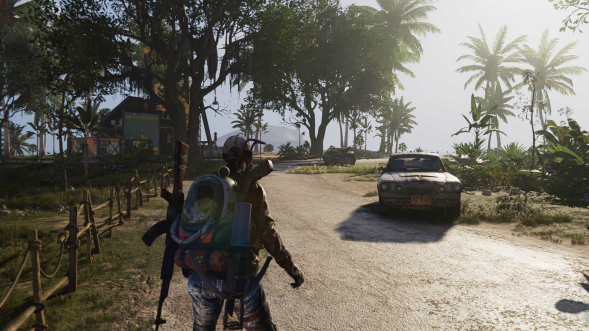 The player character is on an island facing some abandoned cars in Once Human - 1