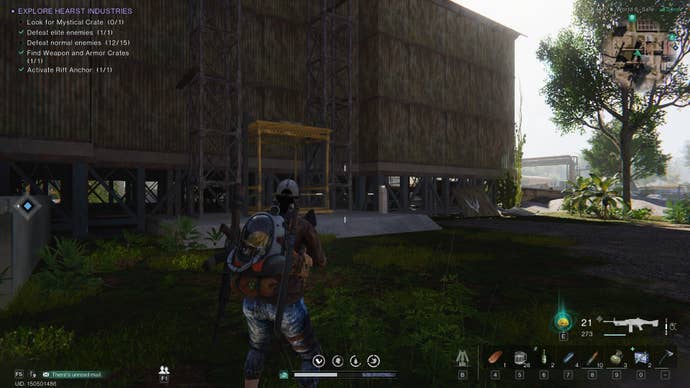 The player looks at an elevator behind a warehouse in Once Human’s Hearst Industries