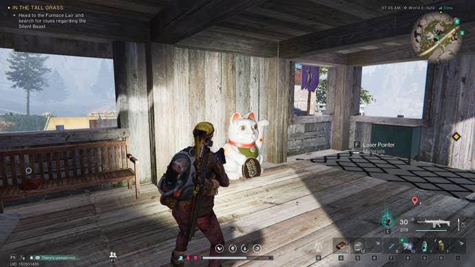 The player looks at a Lucky Cat at the Believer Colony in Once Human