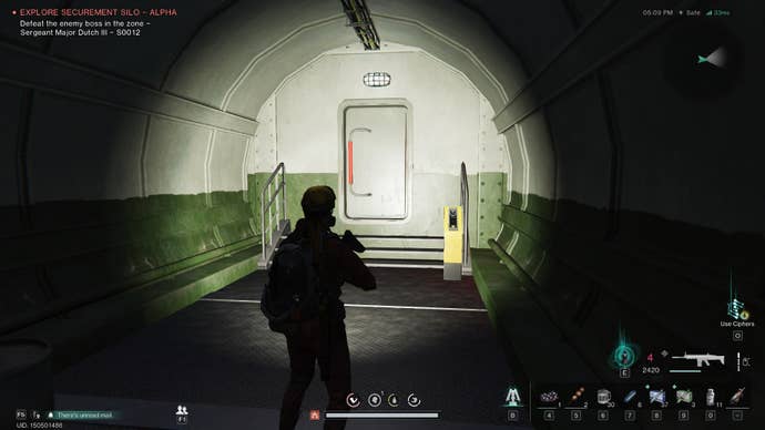 The player looks at a door with an Access Card Terminal next to it in the Securement Silo Alpha in Once Human