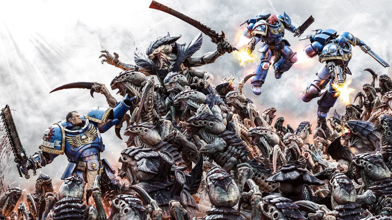 Expanded box art for Warhammer 40,000: Space Marine 2 featuring three Ultramarines fighting off a horde of Tyranids on a grey smoke background