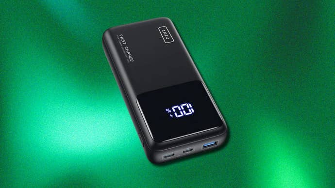 INIU 25000mAh Laptop Power Bank connected a greenish gradient background