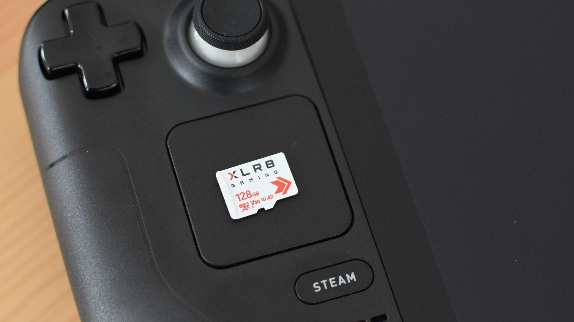The PNY XLR8 microSD card on top of a Steam Deck. - 15