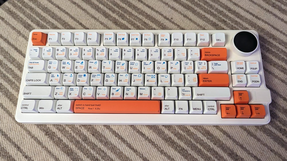 a gamakay lk75 keyboard on a table